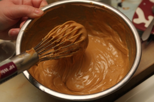 Mixing the peanut butter for triple chocolate peanut butter brownies